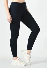 Waylene Navy Blue High-Waisted Yoga Leggings, angled view showing ankle-length cut and smooth finish.