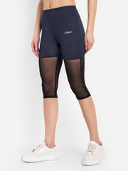 Waylene Navy Blue High-Waisted Capri Leggings with Mesh Inserts, side view.