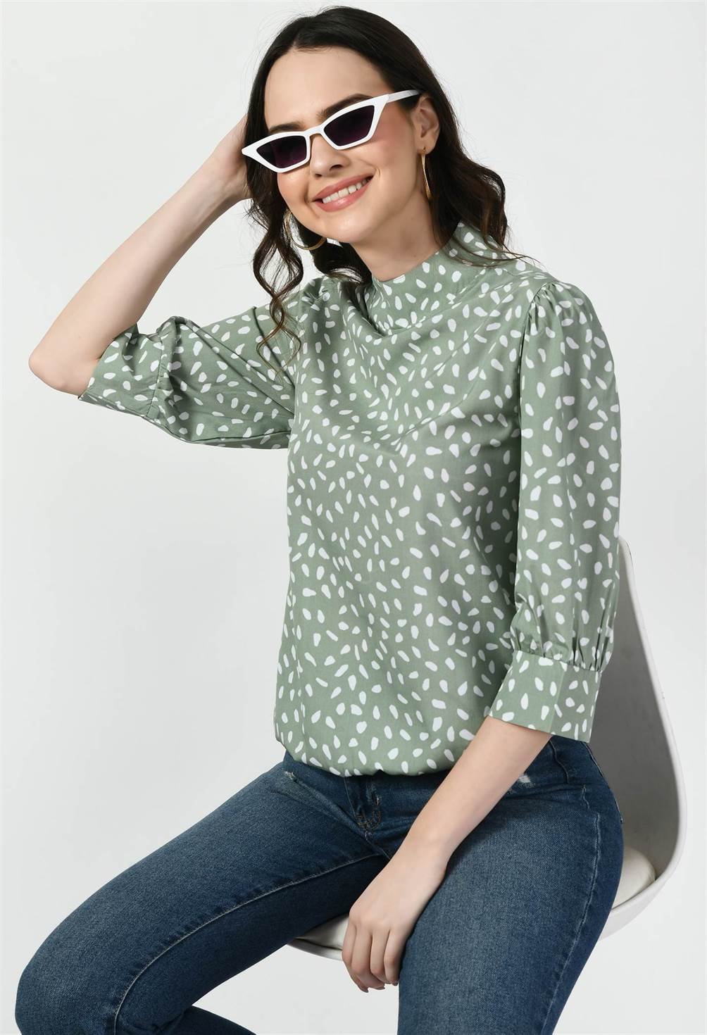 Waylene Pista Green High Neck Western Top Styled with Sunglasses, Seated Pose